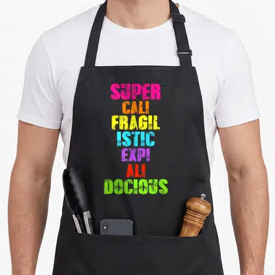 Tablier de cuisine noir avec Super-Cali-Fragilistic-Expi-Ali-Douceus arc-en-ciel typographie décontractée