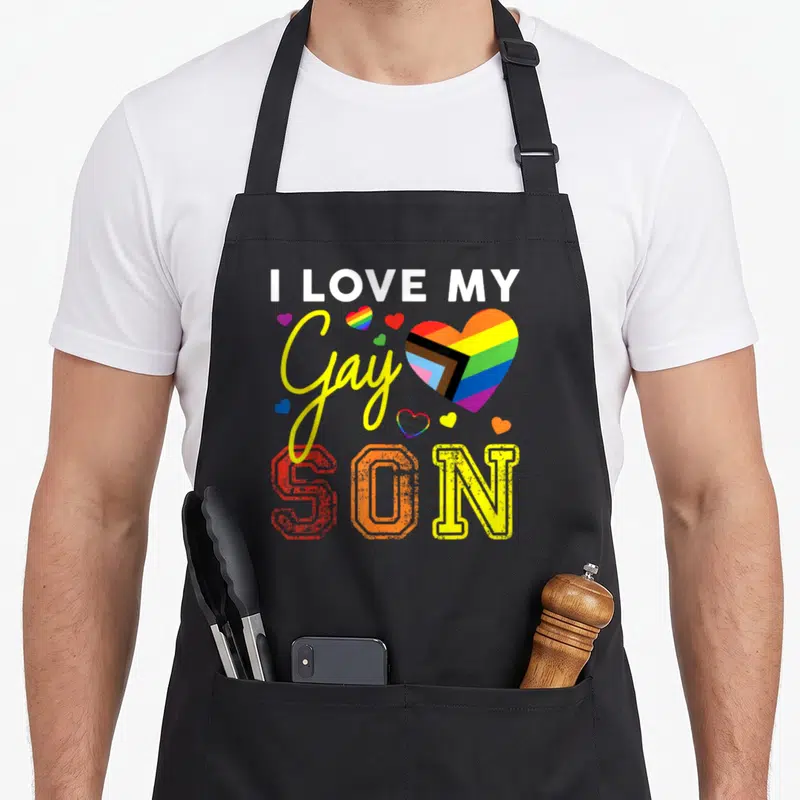 Tablier de cuisine noir avec texte J'aime mon fils gay et cœur arc-en-ciel multicolore.