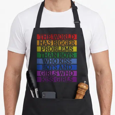 Tablier de cuisine noir avec texte multicolore The World Has Bigger Problems Than Boys Who Kiss Boys and Girls Who Kiss Girls