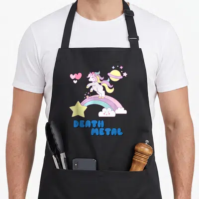 Tablier de cuisine noir avec une licorne sur un arc-en-ciel et le texte Death Metal en lettres bleues.