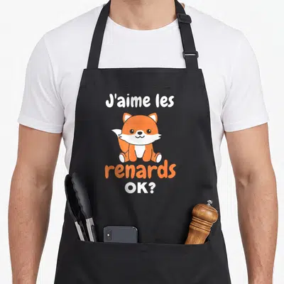 Tablier de cuisine noir avec un renard orange assis et le texte J'aime les renards OK ?