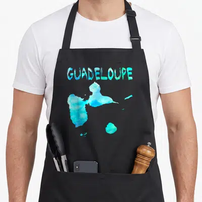 Tablier de cuisine noir avec carte de Guadeloupe aquarelle bleue et texte stylisé