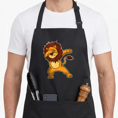 Tablier de cuisine noir avec un lion orange effectuant la pose dab stylisée.