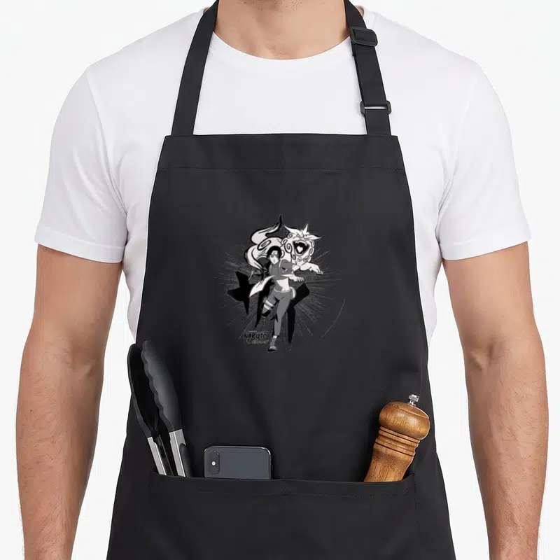 Tablier de cuisine noir avec illustration de Sai et un lion blanc dans un style manga noir et blanc.