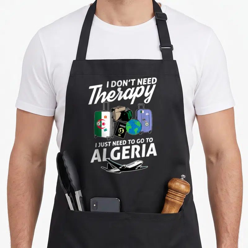 Tablier de cuisine noir avec inscription I don't need therapy, valises, drapeau Algérie et avion blanc.