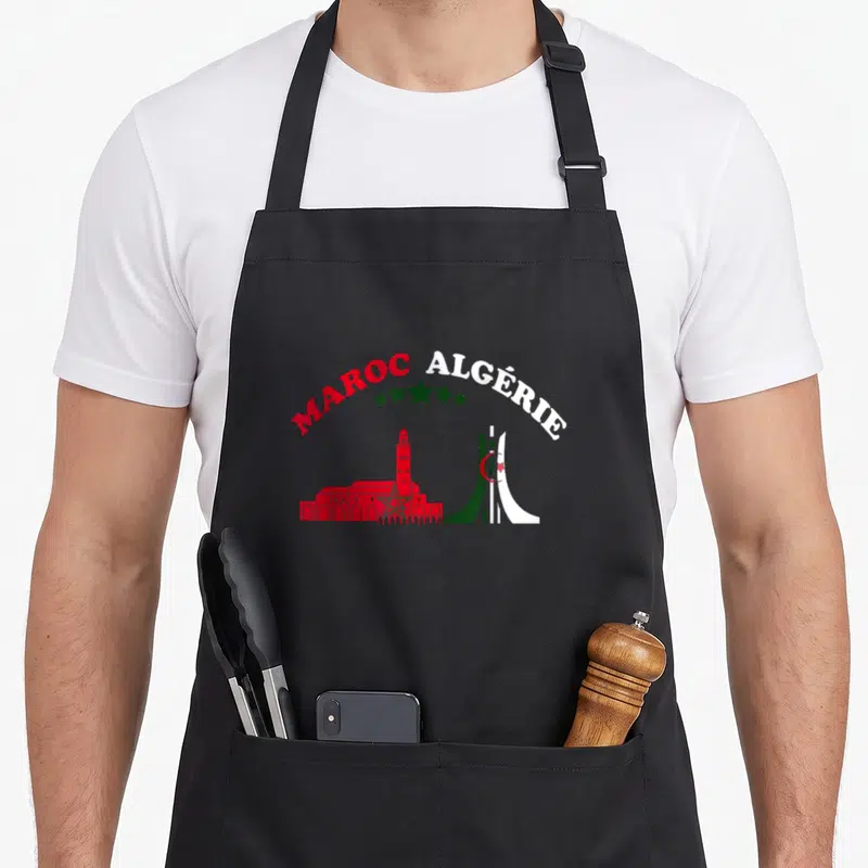 Tablier de cuisine noir avec illustration rouge et verte des monuments du Maroc et de l'Algérie sous le texte Maroc Algérie