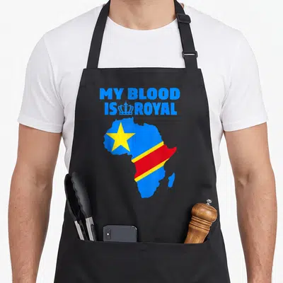 Tablier de cuisine noir avec une carte dAfrique bleue rouge et jaune portant une étoile et une couronne.