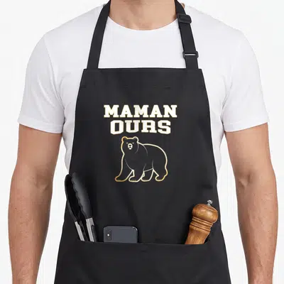 Tablier de cuisine noir avec illustration d'ours et texte MAMAN OURS en blanc et doré.