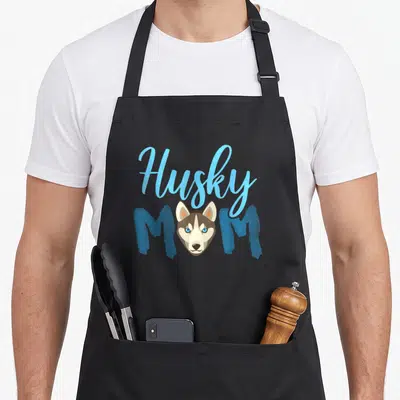 Tablier de cuisine noir avec illustration Husky Mmm et visage de chien aux yeux bleus