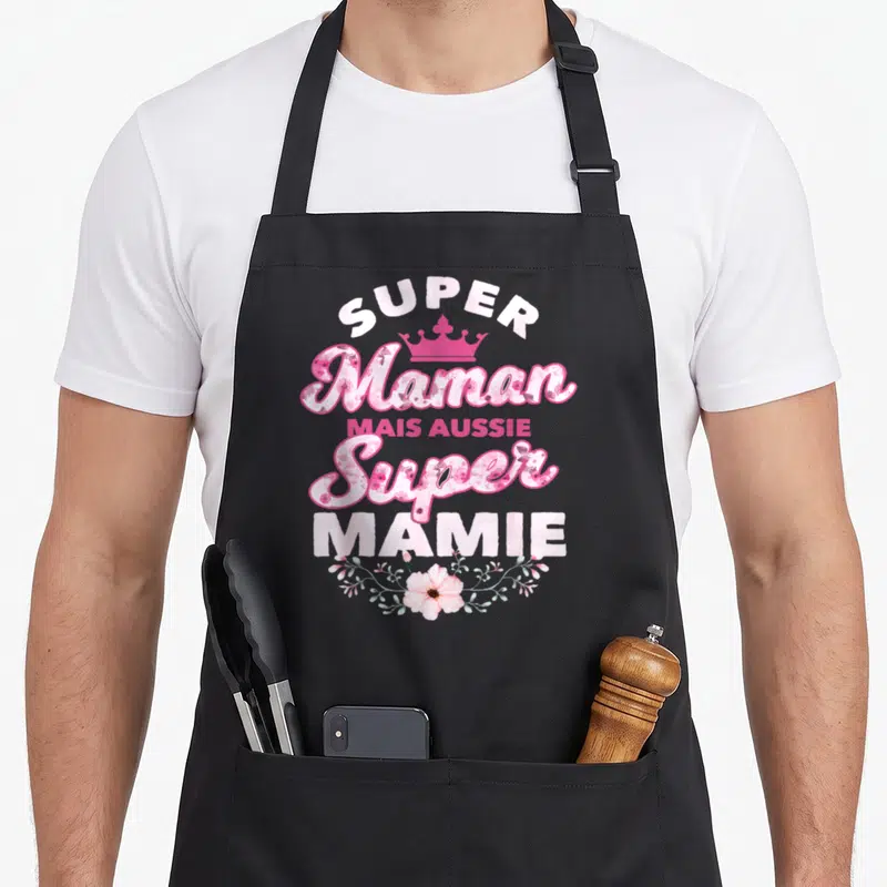 Tablier de cuisine noir avec inscription Super Maman mais aussi Super Mamie en rose floral et couronne.