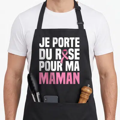 Tablier de cuisine noir avec inscription blanche et rose Je porte du rose pour ma maman et un ruban symbolique.