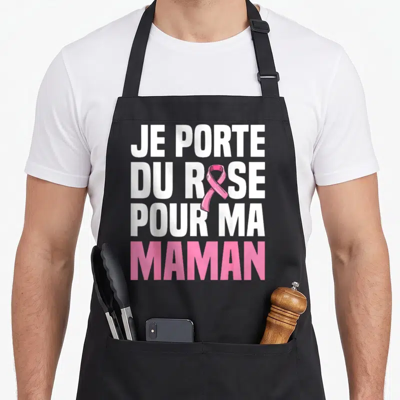 Tablier de cuisine noir avec inscription blanche et rose Je porte du rose pour ma maman et un ruban symbolique.