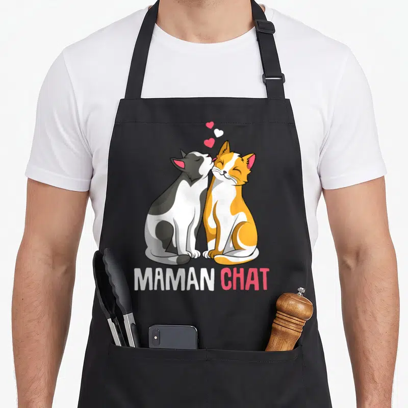 Tablier de cuisine noir avec deux chats s'embrassant et le texte Maman Chat en bas.