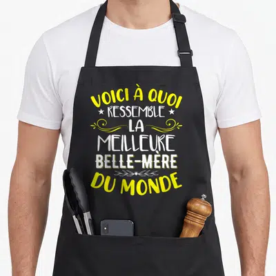 Tablier de cuisine noir avec inscription jaune et blanche Voici à quoi ressemble la meilleure belle-mère du monde.