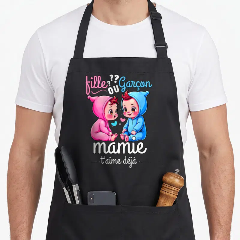 Tablier de cuisine noir avec illustration de deux bébés et texte mamie t'aime déjà