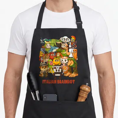 Tablier de cuisine noir avec une illustration colorée de personnages anime et d'animaux stylisés sous le texte Italian Brainrot.