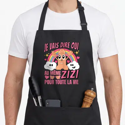 Tablier de cuisine noir avec illustration rose et texte Je vais dire oui au même zizi pour toute la vie.