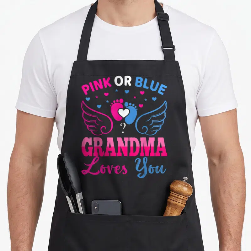 Tablier de cuisine noir avec motif rose et bleu pieds d'anges et inscription Grandma Loves You Gender Baby Révélation