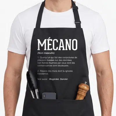 Tablier de cuisine noir avec la définition dictionnaire du mecano en texte blanc centré