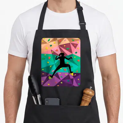 Tablier de cuisine noir avec silhouette fille escalade murale blocs colorés géométriques rose vert violet jaune