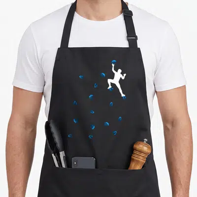 Tablier de cuisine noir avec silhouette blanche escalade et prises bleues boulder dispersées.