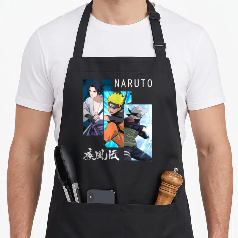 Tablier de cuisine noir avec Naruto, Sasuke et Kakashi en trois panneaux verticaux et le titre Naruto en blanc.