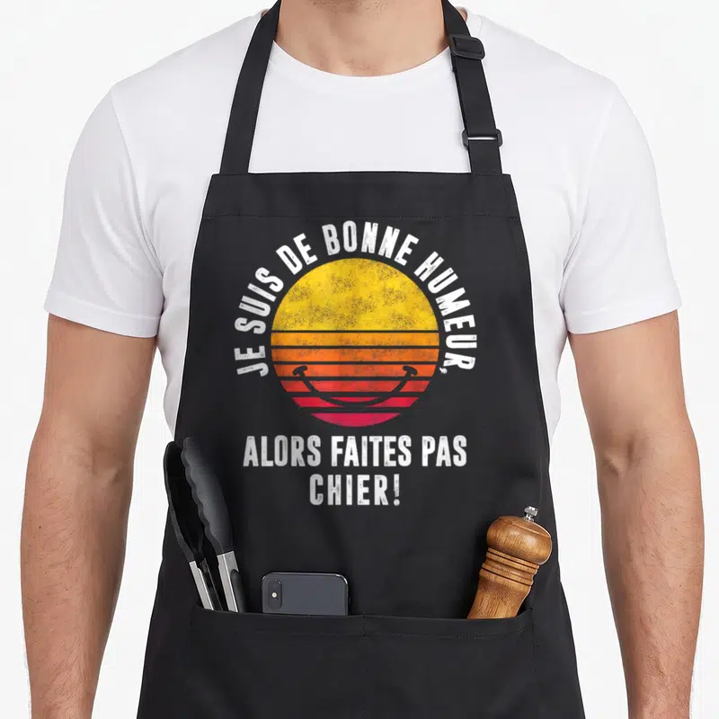 Tablier de cuisine noir avec illustration de soleil rétro et texte blanc Je suis de bonne humeur alors faites pas chier