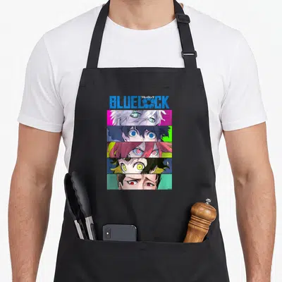 Tablier de cuisine noir avec les yeux colorés des personnages de Blue Lock et le logo du titre imprimé en haut.