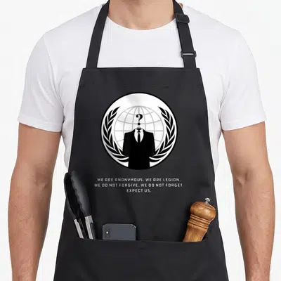 Tablier de cuisine noir avec silhouette en costume et globe terrestre entouré de branches.