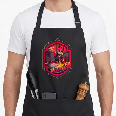 Tablier de cuisine noir avec illustration d'Alastor souriant dans un cadre rose et or.