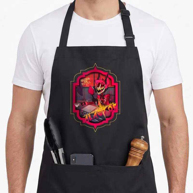 Tablier de cuisine noir avec illustration d'Alastor souriant dans un cadre rose et or.