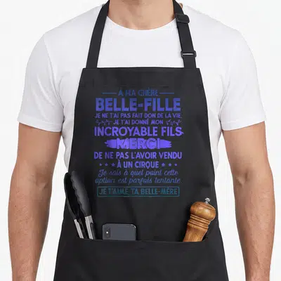 Tablier de cuisine noir avec texte bleu à ma chère belle-fille et message humoristique sur l'incroyable fils.