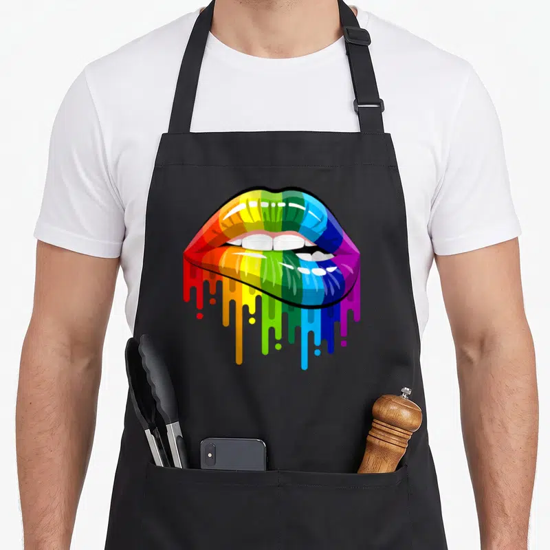 Tablier de cuisine noir avec lèvres multicolores style années 80 et peinture qui dégouline