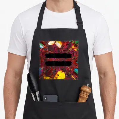 Tablier de cuisine noir avec deux bandes noires horizontales sur fond abstrait rose, jaune et papillons colorés.