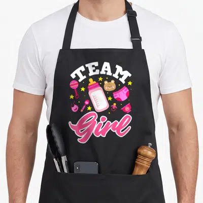 Tablier de cuisine noir avec illustration Team Girl rose, biberon, ours et étoiles jaunes.