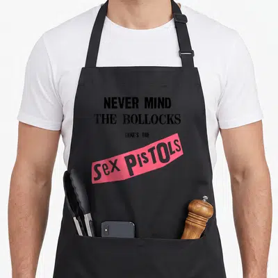 Tablier de cuisine noir avec l'inscription Never Mind The Bollocks Here's The Sex Pistols en rose et noir