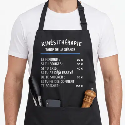 Tablier de cuisine noir avec un tableau blanc listant les tarifs humoristiques d'une séance de kinésithérapie.