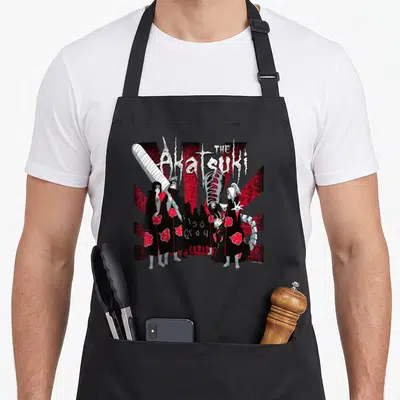 Tablier de cuisine noir avec illustration des membres de l'Akatsuki en robes noires et leurs armes caractéristiques.
