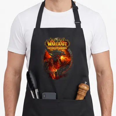 Tablier de cuisine noir avec l'illustration du dragon Deathwing et le titre World of Warcraft Cataclysm.