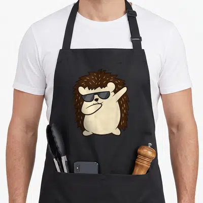Tablier de cuisine noir avec illustration d'un hérisson aux lunettes noires effectuant un mouvement dab.