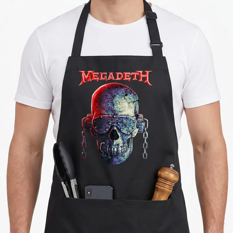 Tablier de cuisine noir avec illustration du crâne blindé de Big Vic et le logo Megadeth en rouge au-dessus.