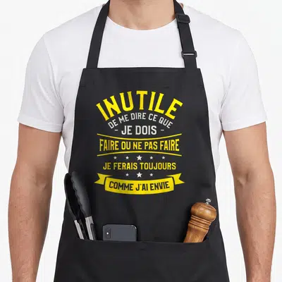 Tablier de cuisine noir avec inscription jaune et blanche Inutile de me dire ce que je dois faire ou ne pas faire Je ferais toujours comme j'ai envie.