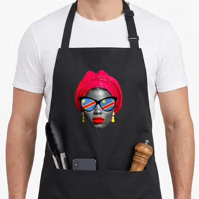 Tablier de cuisine noir avec portrait d'une femme au turban rose et lunettes au drapeau congolais.