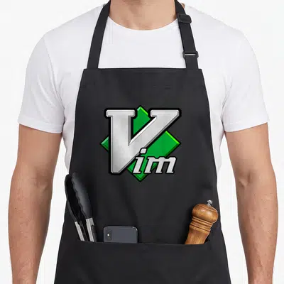 Tablier de cuisine noir avec logo Vim éditeur de texte script en vert et gris.