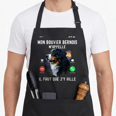 Tablier de cuisine noir avec illustration d'un Bouvier Bernois et texte écran de téléphone mobile.