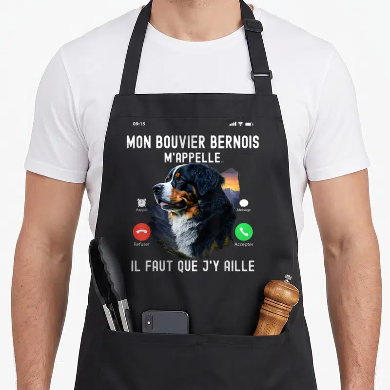 Tablier de cuisine noir avec illustration d'un Bouvier Bernois et texte écran de téléphone mobile.