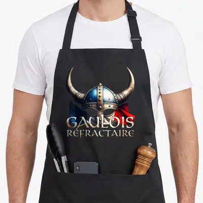Tablier de cuisine noir avec casque gaulois à cornes et drapeau français imprimé.