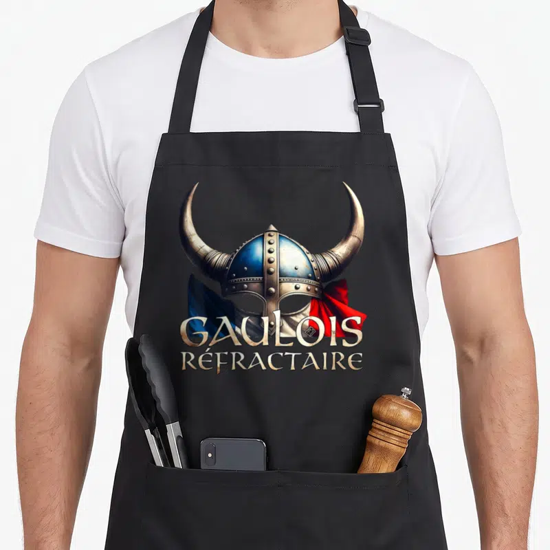 Tablier de cuisine noir avec casque gaulois à cornes et drapeau français imprimé.