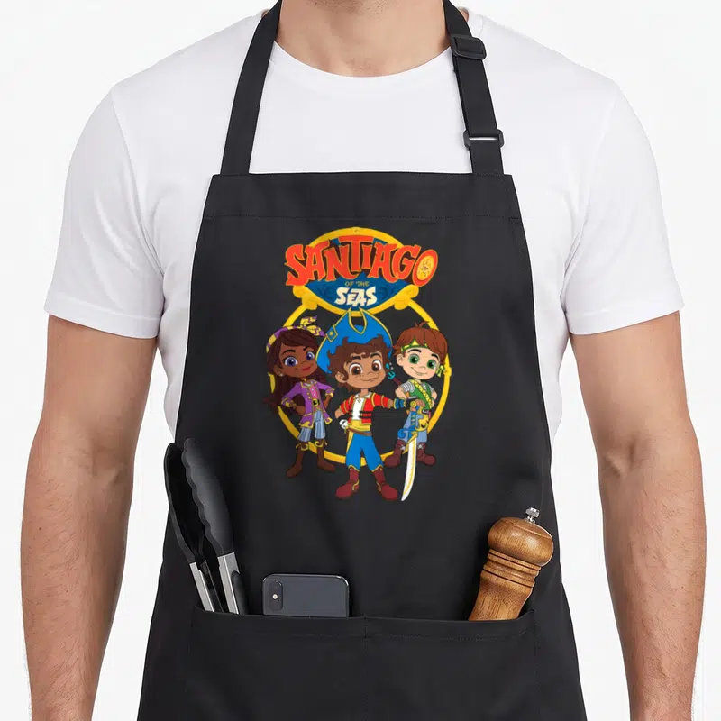 Tablier de cuisine noir avec illustration des personnages d'Enfant Santiago par les mers et leur logo.