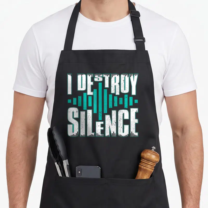 Tablier de cuisine noir avec inscription I Destroy Silence en lettres blanches et graphismes audio turquoise.
